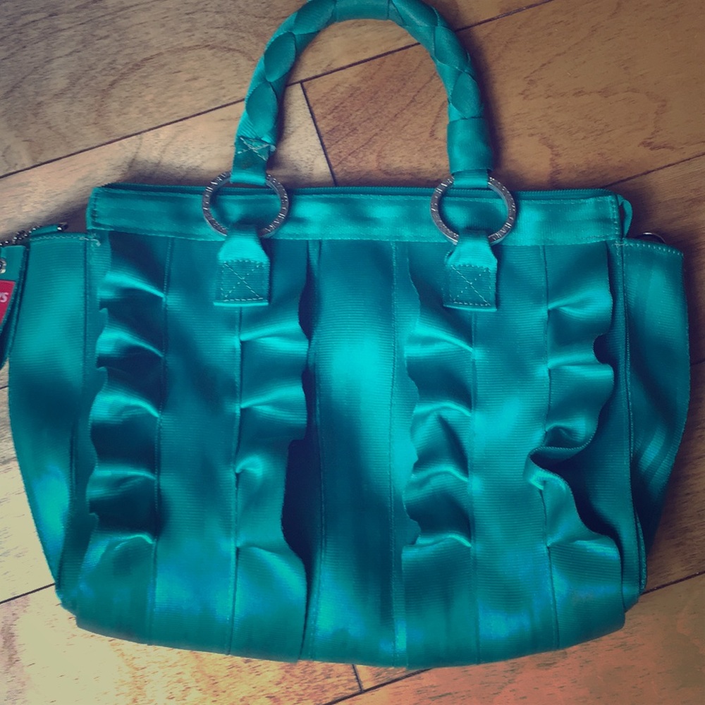 Harvey’s Seatbelt Bag Lola ruffle satchel.